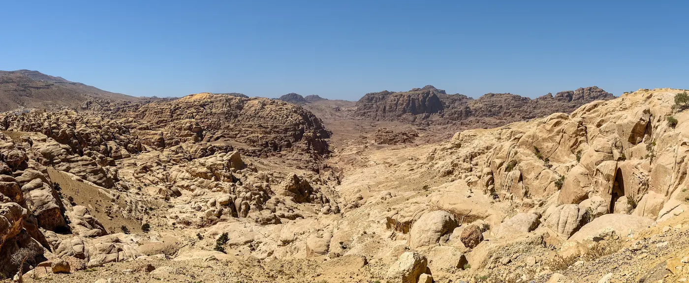 A panorama of the mountains around Petra under a clear sky